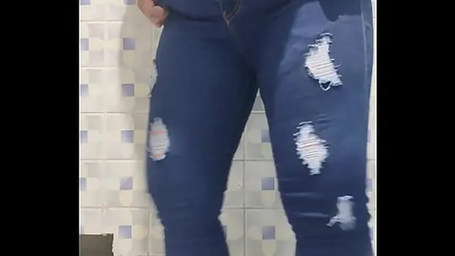 Curvy lady caught in a public restroom